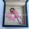 Dinero en el Caballo Cuero de Vaca Creativo Exquisito Casual Regalo de Pareja Bolso Lindo Colgante Llavero de Coche Llavero