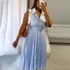 Moda Femenina Transfronteriza Europea y Americana Verano 2026 Nuevo Elegante Vestido sin Mangas a Rayas con Cuello de Solapa y Pliegues