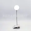 Puede ajustar el ángulo de la manguera de plástico alta y baja, atenuación de tres velocidades, luz LED recargable con clip, luz nocturna