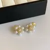 Nuevos Pendientes de Clip para Orejas con Flor de Perla y Espiral para Mosquitos para Mujer, Pendientes de Nicho de Gama Alta, Pendientes de Lujo Ligero de Moda y Versátiles para Mujer