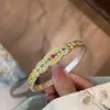 Pulseira de Prata Pura 999.9 com Design em Esmalte Dourado, Apresentando uma Borboleta e Motivos Tradicionais Chineses, Pulseira Aberta de Prata Maciça em Novo Estilo Chinês