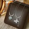 Collar Colgante de Mariposa con Goteo de Aceite Estilo Coreano Exquisito Lujo Ligero Gama Alta Cadena para Clavícula de Temperamento Suave Versátil Gargantilla Retro