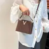 2025 Nuevo Patrón de Piedra Portátil Accesible Lujo Moda Hombro Único Retro Elegante Cruzado de Cuerpo Tendencia Bolso Cubo Pequeño para Mujer
