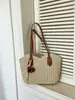 Bolso de paja con borlas transfronterizo, nuevo bolso tejido de paja, bolso de playa para vacaciones, bolso de hombro versátil, bolso tote de verano para el día a día