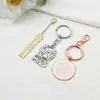 Llavero de pulsera de aleación de zinc directo de fábrica con anillo pequeño diseño de colgante se puede fijar etiqueta de metal con logo colgante