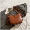 Bolso de Axila de Aspecto Retro de Alta Calidad para Mujer 2025 Nuevo Bolso Cubo Simple Textura de Nicho Hombro Único Cruzado Bolso para Teléfono Móvil
