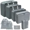 Set organizador de viaje premium, incluye 11 piezas: bolsas para guardar ropa, bolsas con cordón, bolsas para cosméticos y artículos de tocador, y bolsas de malla plegables para almacenamiento