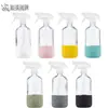 Venta al por mayor de fábrica en stock botella de vidrio transparente 500 ml aceite esencial subenvasado botella de desinfectante de manos botella Boston con atomizador funda de silicona