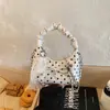 Bolsa de Bolinhas para Mulheres 2026 Novo Estilo Bolsa de Mão com Laço Bolsa de Ombro em Corrente para o Verão Bolsa Transversal de Alta Qualidade para o Dia a Dia