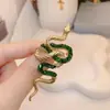 Broche de Serpiente de Cristal del Año Nuevo Chino Serpiente del Zodiaco Lujo Ligero de Alta Calidad Moda Personalizada Versátil Pin para Traje Chaqueta Serpiente