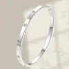 Bestseller transfronteiriço europeu e americano: Pulseira de aço titânio com dez diamantes, banhada a ouro 18k, não desbota, design de luxo leve