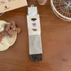 Nueva colección otoño e invierno de Songmu: calcetines de dedos divididos de moda para mujer, con lindos diseños de pata de cerdo y pata de oveja de dibujos animados, longitud hasta la mitad de la pantorrilla, hechos de algodón