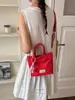 Bolso de mano de lunares con flecos estilo coreano para mujer, nuevo y versátil bolso de hombro, bolso cruzado y bolso para teléfono 2026