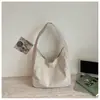Bolso de Lona para Axila de Gran Capacidad 2026 Nuevo Bolso Tote para Viajes Cotidianos Simple Elegante Estudiante Universitario Clase Bolso de Hombro Único Mujer