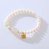Pulsera de perlas de agua dulce barrocas simples y modernas de diseño nicho de lujo ligero, con colgante de conejo Tigre, pulsera de cuentas para mujer
