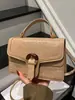 Bolso pequeño de mano de alta gama transfronterizo para mujer, nuevo diseño de moda, pequeño bolso cuadrado de lujo ligero, versátil para ir al trabajo, de un solo hombro, cruzado, moderno