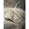 DestacadoYuran 26 Nueva Colección de Principios de Otoño: Camisa a la moda y estilizada de manga corta con cuello pequeño de solapa y borde sin rematar