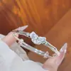 Nuevo brazalete deslizante de nudo de bambú estilo chino con mariposa para mujer, simple y moderno, diseño versátil, lujo ligero con un toque de alta gama estilo chino