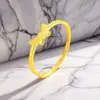 Anillo abierto de nudo de mariposa de oro de arena vietnamita para mujer, moderno, simple, versátil, anillo ajustable, suministro mayorista para transmisión en vivo
