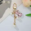 Llavero Colgante de Conejo de Cristal Colorido Incrustado con Diamantes de Venta Caliente Transfronteriza Accesorios de Encanto para Bolsos de Cadena de Teléfono Perla DIY