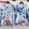 Top de ganchillo tie-dye estilo étnico Guangxi hueco tejido con borla colgante cinturón de condole tie-dye top pequeño al por mayor