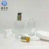 Botella dispensadora de sérum de esencia con bomba de presión, botella de vidrio de 50 ml 100 ml, botella de aceite esencial para el cuidado del cabello, botella de aceite para el cabello, en stock