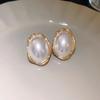 Aretes de perlas ovaladas para mujer 2023 nuevos aretes exagerados de estilo occidental diseño único de nicho aretes de temperamento retro
