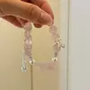 Pulsera bicolor de cristal azul natural y cristal rosa con diseño de oso y rosa, una pulsera blanca de lujo ligero y estilo antiguo fresco.