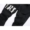 2025 Nuevo Comercio Exterior Moda de Calle Juvenil Negro Rasgado Bordado Elástico Ajustado Pierna Jeans para Hombre Tendencia