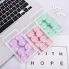 Venta al por mayor de fábrica Clips para papel color macarrón Pequeños Frescos Creativos En caja Clip de cola de golondrina Papelería de oficina Etiqueta para llaves Banda de goma