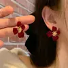 Pendientes de botón de flor roja de Año Nuevo para mujer 2024 Nuevos pendientes geométricos irregulares elegantes accesorios simples que combinan con todo