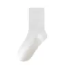 Otoño 2026 Moda Minimalista Versátil Color Sólido Clase A Algodón Puro Calcetines para Niños Transpirables Absorbentes de Sudor de Media Pantorrilla para Niños Mayores