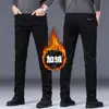 Jeans pretos de primavera e outono de Hong Kong para homens, calças skinny de corte justo, elásticas, calças compridas de negócios casuais de alta qualidade para homens de meia-idade