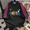Camiseta Manga Curta com Estampa Divertida de Desenho e Design Color-Blocking 2026 Verão Nova Versátil Vintage Top