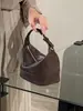 Bolsa de mão tipo balde em couro legítimo 2026 novo estilo mini hobo retrô bolsa de nicho de couro bovino de primeira camada transversal para mulheres