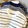 Toma real Otoño Invierno Nuevo Estilo Coreano Gama Alta Sencillo Temperamento Moda Suéter de Punto Rayado Jersey Superior