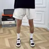 Retro Americano Simples Verão Pesado Casual Americano Shorts Calças Esportivas Masculinas e Femininas Soltas Calças Versáteis