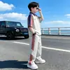 Traje de Verão Masculino Manga Curta 2026 Novo Estilo Crianças Médias e Grandes Verão Meninos Fino Soltinho Camisa Polo Infantil Esportiva
