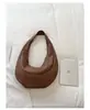 Bolsa Mensual de Gran Capacidad de Comercio Exterior Bolsa de Media Luna para Mujer Estilo Nuevo 2026 Bolso de Hombro Único de Cuero Suave Bolso Casual para Viaje y Commute Bolso de Empanada