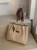 Bolso de mano grande cruzado estilo coreano vintage casual para el trabajo y los desplazamientos, nuevo bolso de hombro tipo tote tejido 2026