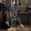 Coleção de inverno 2026: Calça casual estilo americano com forro de fleece para homens, apresentando um design moderno, de corte solto, plus size, com tornozelos afunilados