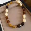 Collar de doble capa con cuentas acrílicas transfronterizo europeo y americano, cadena para la clavícula de lujo ligero de alta gama, joyería de estilo étnico vintage al por mayor