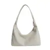 Bolsa feminina grande vintage, nova coleção outono 2026, design casual de nicho, bolsa de ombro e transversal, bolsa de bolinho para o dia a dia