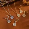 Aretes y Collar de Moda Europea y Americana Transfronterizos con Incrustaciones de Circonita en Cobre y Set de Joyería para Mujer, Set de Pinza para Oreja con Cadena de Acero Inoxidable de Lujo Ligero