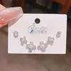 Verano nuevo chapado en oro real exquisitos tres pares de aretes pequeños de alto sentido pequeños frescos dulces aretes de temperamento combinables