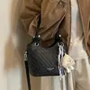 Bolso pequeño popular de textura tejida transfronterizo para mujer, nuevo y elegante, bolso tipo cubo retro, bolso de hombro cruzado de alta moda para el trabajo