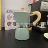 Cafetera italiana Moka de fábrica con mango de madera, clásica y sencilla, para el hogar, disponible al por mayor.