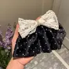 Grampo de Cabelo com Laço de Bolinhas Estilo Coreano Grampo de Primavera para Mulheres 2026 Novo Estilo Atmosférico Grampo de Agarrar Parte de Trás da Cabeça Grampo de Cabelo Acessórios de Cabelo