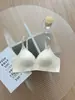 Lencería sin costuras, casi imperceptible, con tirantes delicados y brillantes, fina y cómoda, transpirable, nuevo estilo 2026, sujetador popular para mujer en color nude