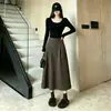 Falda midi floral estilo coreano línea A para mujer 2026, de cintura alta, que cubre las caderas, adelgazante, retro, falda versátil transfronteriza